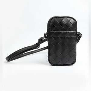 Small Black woven cross body bag.